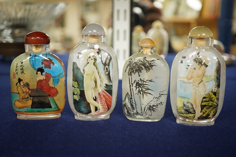 Four Chinese inside painted glass snuff bottles, tallest 9cm